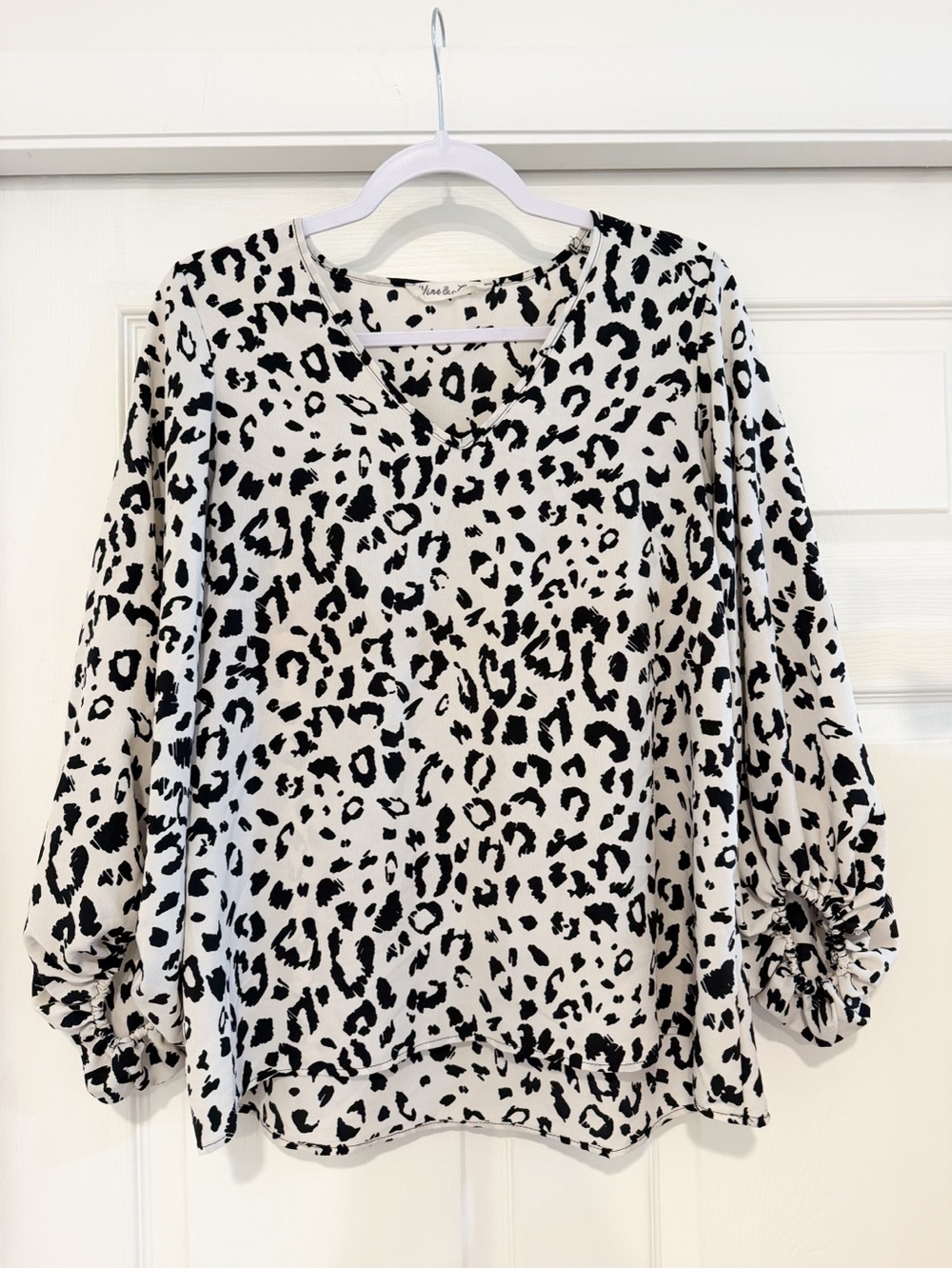Vine & Love Black and White Leopard Print V-Neck Blouse
